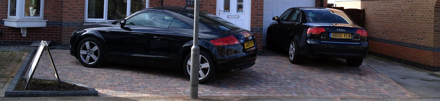 One driveway, two cars